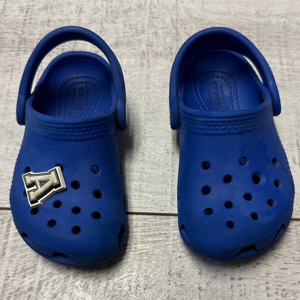 CROCS Kids Blue Clogs with Silver Charm